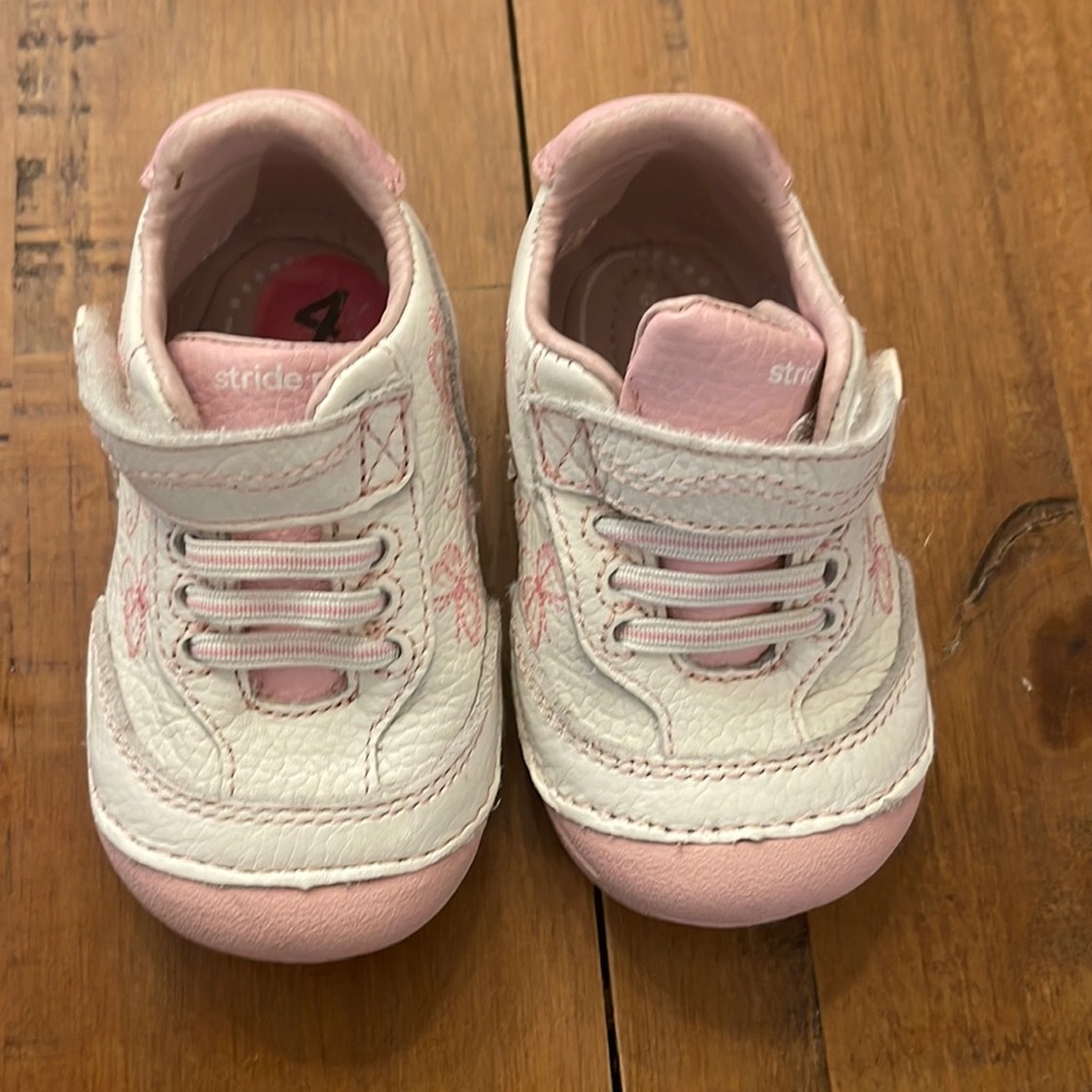White and pink size 4 lightly worn shoes
